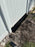 Installed HDPE as a water barrier under fence