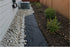 Filter fabric for side yard gravel and mulch drainage
