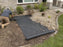 Front yard landscape fabric installation in progress

