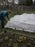 Frost cloth row cover over a garden
