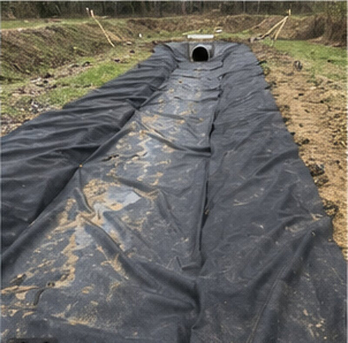 Non-woven geotextile filter fabric in a culvert swale
