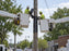 Workers unrolling and installing HDPE pole wrap