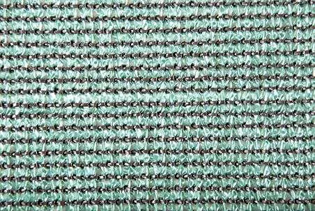 Green knitted shade cloth showing lock-stitch construction