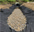 Non-woven geotextile filter fabric under a landscape dry creek bed

