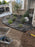 Non-woven geotextile fabric used as a weed barrier under mulch in a landscaped planting bed
