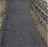 Non-woven geotextile drainage filter fabric behind a retaining wall
