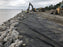 Non-woven geotextile under riprap for coastal shoreline erosion control
