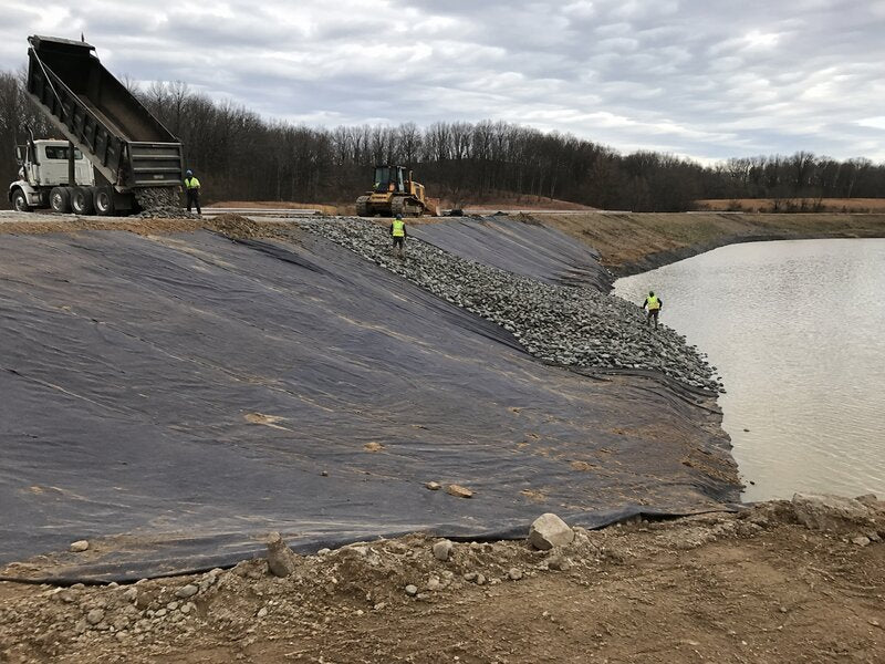 Riprap over geotextile fabric on a reservoir embankment
