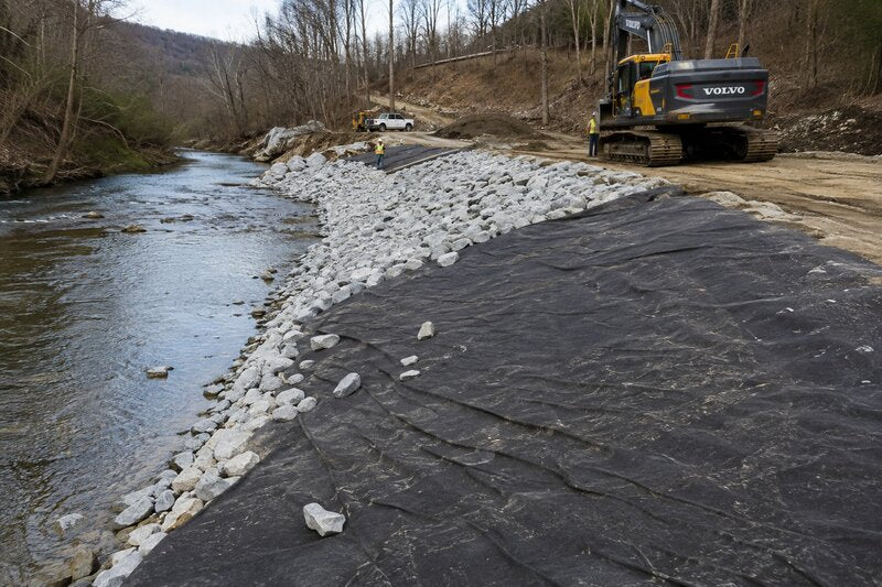 Riprap fabric for riverside bank stabilization
