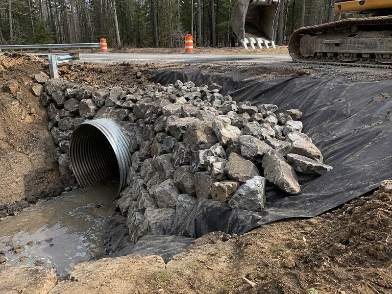 Non-woven geotextile under riprap at a roadside culvert
