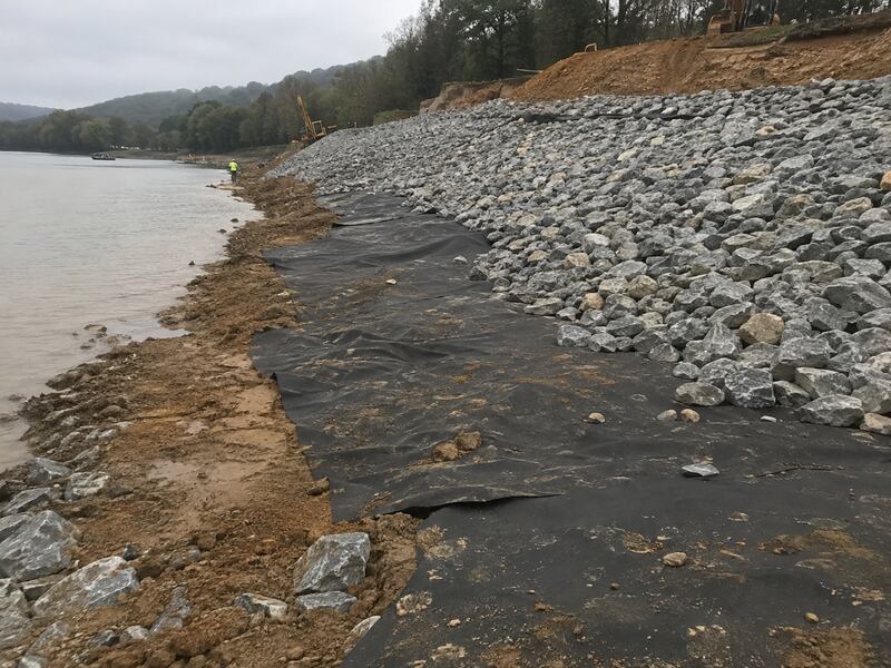 Riprap geotextile fabric stabilizing a riverbank

