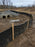 Silt fence around a culvert outlet for sediment control

