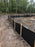 Silt fencing along a construction site
