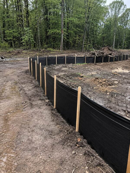 Silt fencing along a construction site
